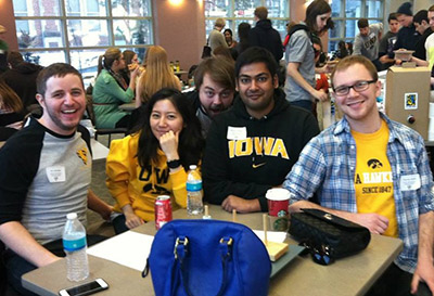 Neuroscience students Ian DeVolder, Jessica Lee, Nate Klooster, Atulya Iyengar, and Tom James take a break to goof off while volunteering at our annual Brain Bee competition for high school students.